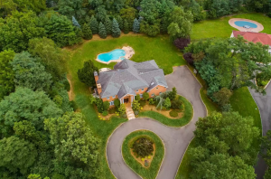 Talk to Paul TTP Ashanti Lists Lovely Long Island Mansion for $2.2M Aerial